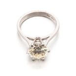 A DIAMOND SOLITAIRE RING claw-set with a round brilliant-cut diamond weighing approximately 3.29cts,