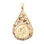 A COIN PENDANT of pear-shaped form, with open work design, embellished with round brilliant-cut