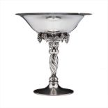 A DANISH SILVER GRAPEVINE PATTERN TAZZA, GEORG JENSEN, COPENHAGEN, POST 1945 the bowl with everted