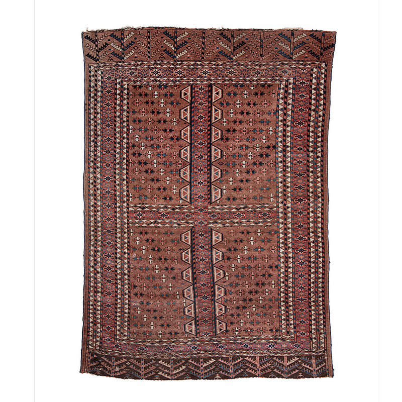 A YAMUT TURKOMAN DOOR RUG, "EUGSI", TURKMENISTAN, CIRCA 1880 the madder field divided into four