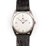 A GENTLEMAN'S 18CT GOLD WRISTWATCH, JAEGER-LECOULTRE manual, the circular silvered dial, applied