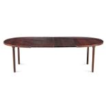 A DANISH ROSEWOOD EXTENDING DINING TABLE, FRANCE & SON, MID 1960's each D-end on turned tapering