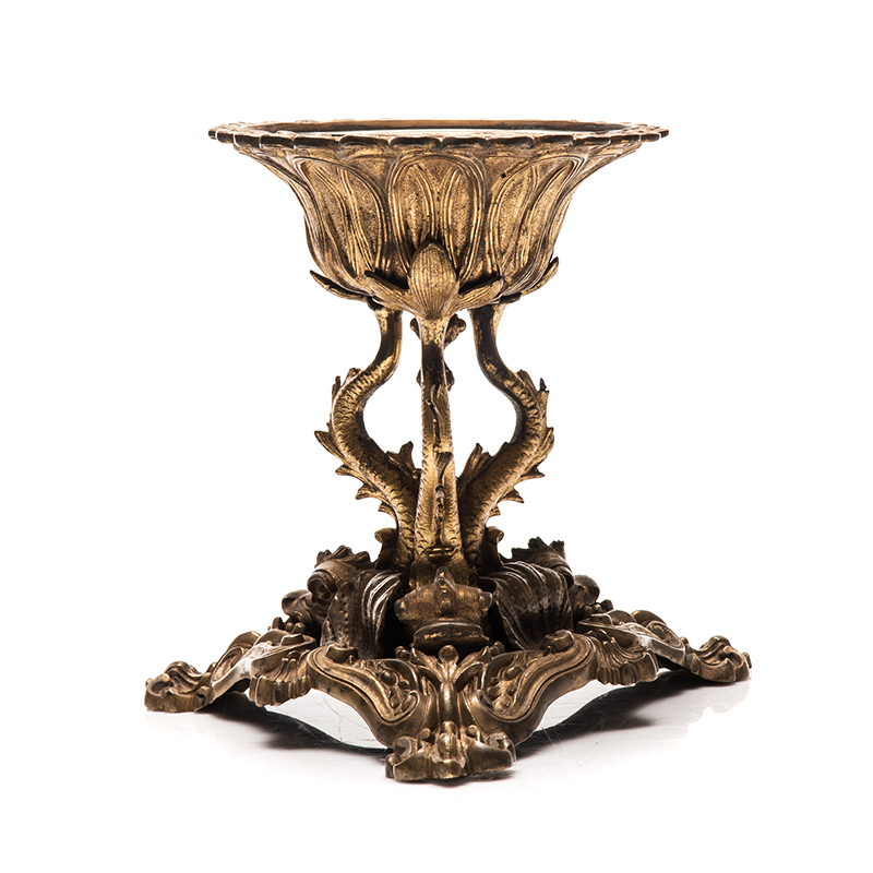 A CONTINENTAL GILT METAL TAZZA raised on scroll and foliate tripartite base with three addorsed