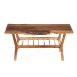 A STINKWOOD COFFEE TABLE MANUFACTURED BY RED TROUT, 2017 the organic shaped top above a slatted