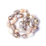 STRAND OF SEMI-BAROQUE STYLE CULTURED PEARLS a single row necklet comprising twenty three semi-