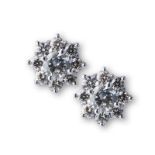 A PAIR OF 18K WHITE GOLD AND DIAMOND STUD EARRINGS each with a centre claw-set diamond surrounded by