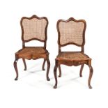 A PAIR OF CAPE ROCOCO STYLE STINKWOOD SIDE CHAIRS, 19TH CENTURY each wavy top rail centred by a