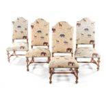 A PAIR OF UPHOLSTERED SIDE CHAIRS each closenailed shaped padded back on turned supports,