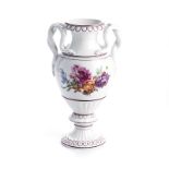 A MEISSEN TWO-HANDLED URN, EARLY 20TH CENTURY the raised lip above a baluster shaped body with