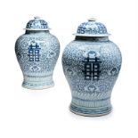 A PAIR OF CHINESE BLUE AND WHITE VASES AND COVERS, EARLY 20TH CENTURY each of baluster form, the rim