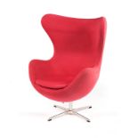 A REPRODUCTION EGG CHAIR DESIGNED IN 1958 BY ARNE JACOBSEN FOR FRITZ HANSEN the upholstered