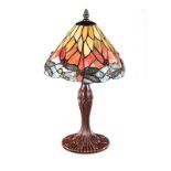 AN ART NOUVEAU STYLE LAMP, 20TH CENTURY the shaped colourful shade surmounted by a finial, above a