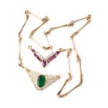 AN INTERCHANGEABLE PETER GILDER NECK PIECE comprising: a central oval emerald weighing approximately