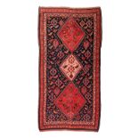 A QASHQAI RUG, SOUTH WEST PERSIA, MODERN condition: fair, colour runs, repair 206 by 115cm