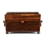 AN ENGLISH MAHOGANY TEA CADDY the hinged stepped rectangular top enclosing a compartment, tapering