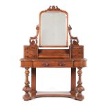 A VICTORIAN MAHOGANY DRESSING TABLE the moulded shaped top surmounted by three short pedestal