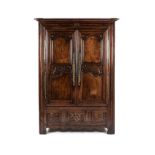 A FRENCH OAK ARMOIRE, 19TH CENTURY the rectangular outswept moulded cornice above a scalloped frieze