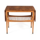 A DANISH BEECH AND TEAK DROP-LEAF TABLE DESIGNED BY HANS WEGNER the hinged rounded rectangular top