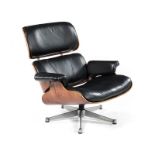 A REPRODUCTION 670 CHAIR DESIGNED IN THE 1950s BY CHARLES AND RAY EAMES the padded button-back and