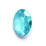 A CERTIFIED 0.917CT UNMOUNTED PARAIBA TYPE TOURMALINE an oval mixed cut Paraiba type tourmaline in a