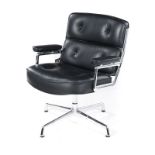 A LEATHER AND CHROME LOBBY ARMCHAIR DESIGNED IN 1960 BY CHARLES AND RAY EAMES FOR VITRA the padded