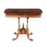 A VICTORIAN WALNUT CARD TABLE the hinged inlaid top enclosing a baize-lined playing surface,