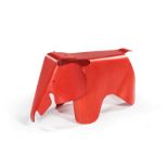 A RED MAPLE PLYWOOD ELEPHANT DESIGNED IN 1945 BY CHARLES AND RAY EAMES FOR VITRA of typical form,