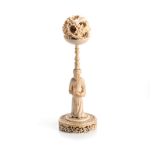 A CHINESE EXPORT IVORY CARVED PUZZLE BALL AND STAND, QING DYNASTY, LATE 19TH CENTURY NOT SUITABLE