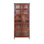 A MAHOGANY LEGAL BOOKCASE, 20TH CENTURY the rectangular outswept top above a plain frieze,
