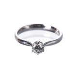 A SOLITAIRE DIAMOND RING, BROWNS claw-set with a ound brilliant-cut diamond weighing 0.427cts,