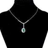 AN EMRALD AND DIAMOND PENDANT NECKLACE centred with an oval mixed-cut emerald weighing 1.68cts,