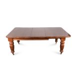 A VICTORIAN MAHOGANY DINING TABLE the rectangular shaped top above a plain frieze terminating in