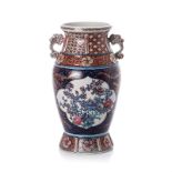 A CHINESE VASE, REPUBLIC PERIOD, 1912 – 1949 the tapering ovoid body on flared base, painted with