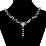 A DIAMOND NECKLACE composed of plain and diamond-set marquise-shaped links, centred with a