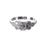 A DIAMOND RING centred with millgrain-set a radiant-cut diamond weighing 0.552cts, flanked on either