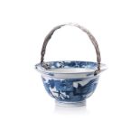 A CHINESE BLUE AND WHITE BOWL, KANGXI, 1662 – 1722 the rim painted with floral motif, the exterior