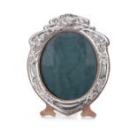 AN EDWARDIAN ART NOUVEAU SILVER MOUNTED PICTURE FRAME, J AITKIN AND SON, BIRMINGHAM, 1906 the wooden