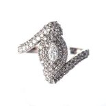 A DIAMOND RING designed as a double band centred with a marquise-cut diamond weighing