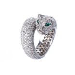 A DIAMOND LEOPARD RING the band terminating in a tail and leopard head with marquise-cut emerald