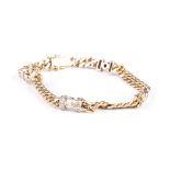 A GOLD AND DIAMOND BRACELET