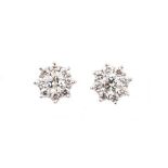 A PAIR OF 18K WHITE GOLD AND DIAMOND STUD EARRINGS