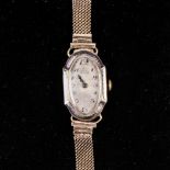 A VINTAGE 18K GOLD LADIES WRISTWATCH, RIVAL