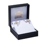 A PAIR OF 18K GOLD AND DIAMOND EARINGS BY PRINS AND PRINS