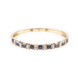 AN 18K YELLOW GOLD, SAPPHIRE AND DIAMOND BANGLE