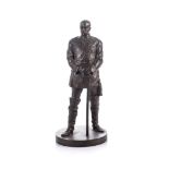A BRONZE FIGURE OF A GERMAN OFFICER, 19TH CENTURY