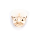 A JAPANESE IVORY MASK NETSUKE, MEIJI PERIOD, 1868 - 1912