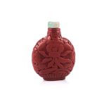 A CHINESE CINNABAR LACQUERED METAL SNUFF BOTTLE