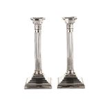 A PAIR OF ELECTROPLATE CORINTHIAN COLUMN CANDLESTICKS, LATE 19TH/EARLY 20TH CENTURY (2) the fluted