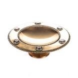 A CONTINENTAL BRASS TAZZA circular, the broad rim mounted with six micro mosaic lozenges,