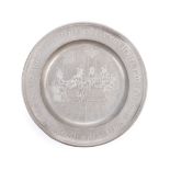 A 17TH CENTURY GERMAN PEWTER SEDER PLATE, TOUCHMARKS FOR 1674 - 1708 circular, the rim engraved with